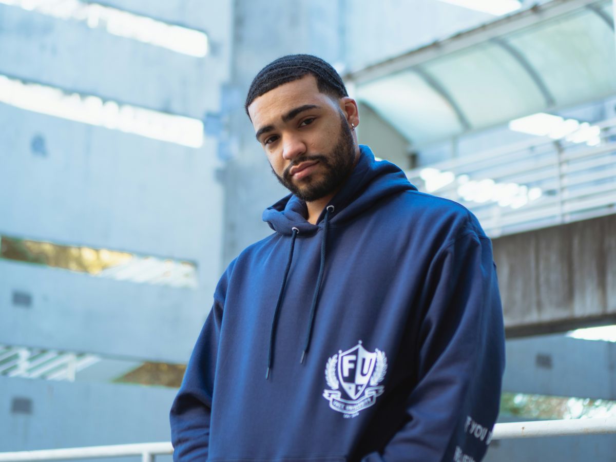 unknown celebrity in blue pull-over hoodie